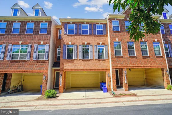 a front view of a multi story residential apartment building