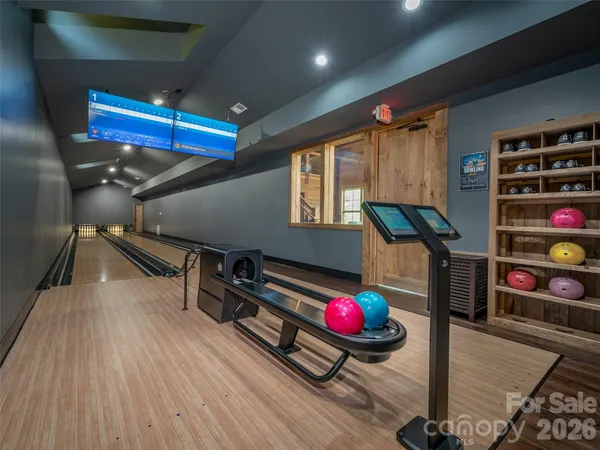 a room with gym equipment and a large window