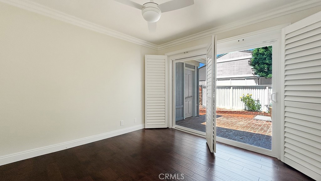 33902 Faeroe Bay Dana Point, CA 92629 - Photo 13 of 22 a view of an empty room with wooden floor and a window