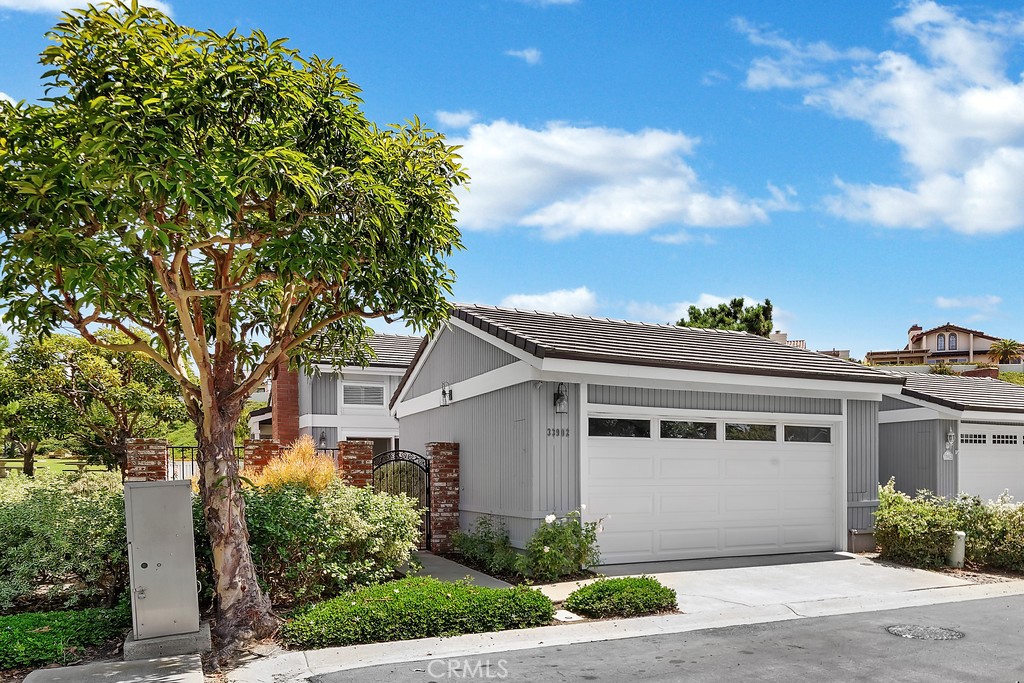 33902 Faeroe Bay Dana Point, CA 92629 - Photo 3 of 22 a front view of a house with a garden