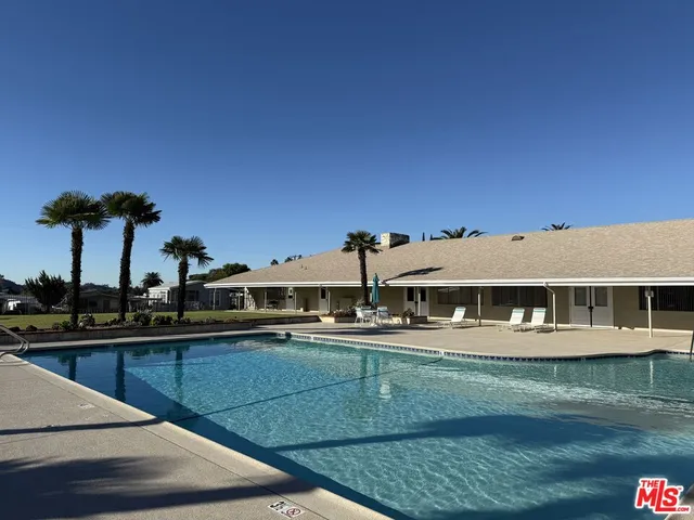 a view of a house with a swimming pool