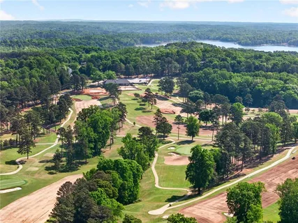 an aerial view of residential house and lake view
