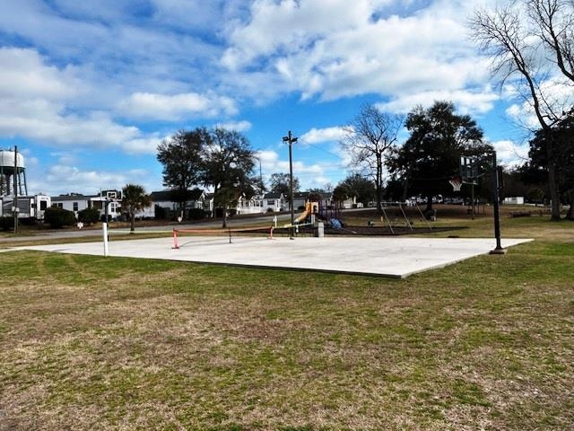 6 Robin Avenue Myrtle Beach, SC 29572 - Photo 21 of 24 Surrounding community with a lawn and community basketball court