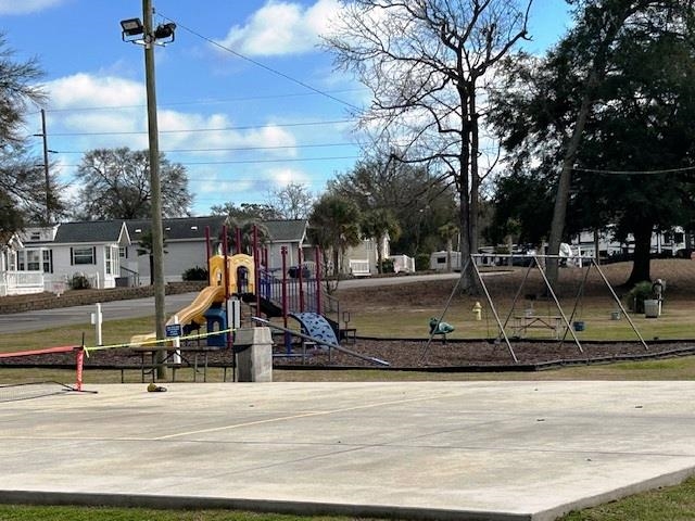 6 Robin Avenue Myrtle Beach, SC 29572 - Photo 22 of 24 Community jungle gym featuring a lawn