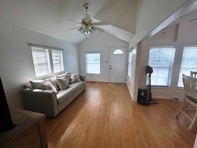 6 Robin Avenue Myrtle Beach, SC 29572 - Photo 3 of 24 Living room featuring wood finished floors, ceiling fan, and lofted ceiling