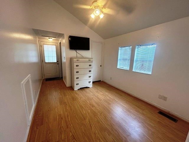 6 Robin Avenue Myrtle Beach, SC 29572 - Photo 6 of 24 Unfurnished bedroom featuring light wood-type flooring, lofted ceiling, and a ceiling fan