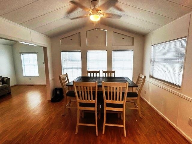 6 Robin Avenue Myrtle Beach, SC 29572 - Photo 7 of 24 Dining area with dark wood-type flooring, ceiling fan, and lofted ceiling