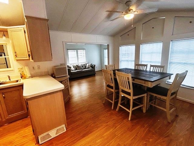 6 Robin Avenue Myrtle Beach, SC 29572 - Photo 8 of 24 Dining room featuring light wood-style flooring, ceiling fan, and lofted ceiling