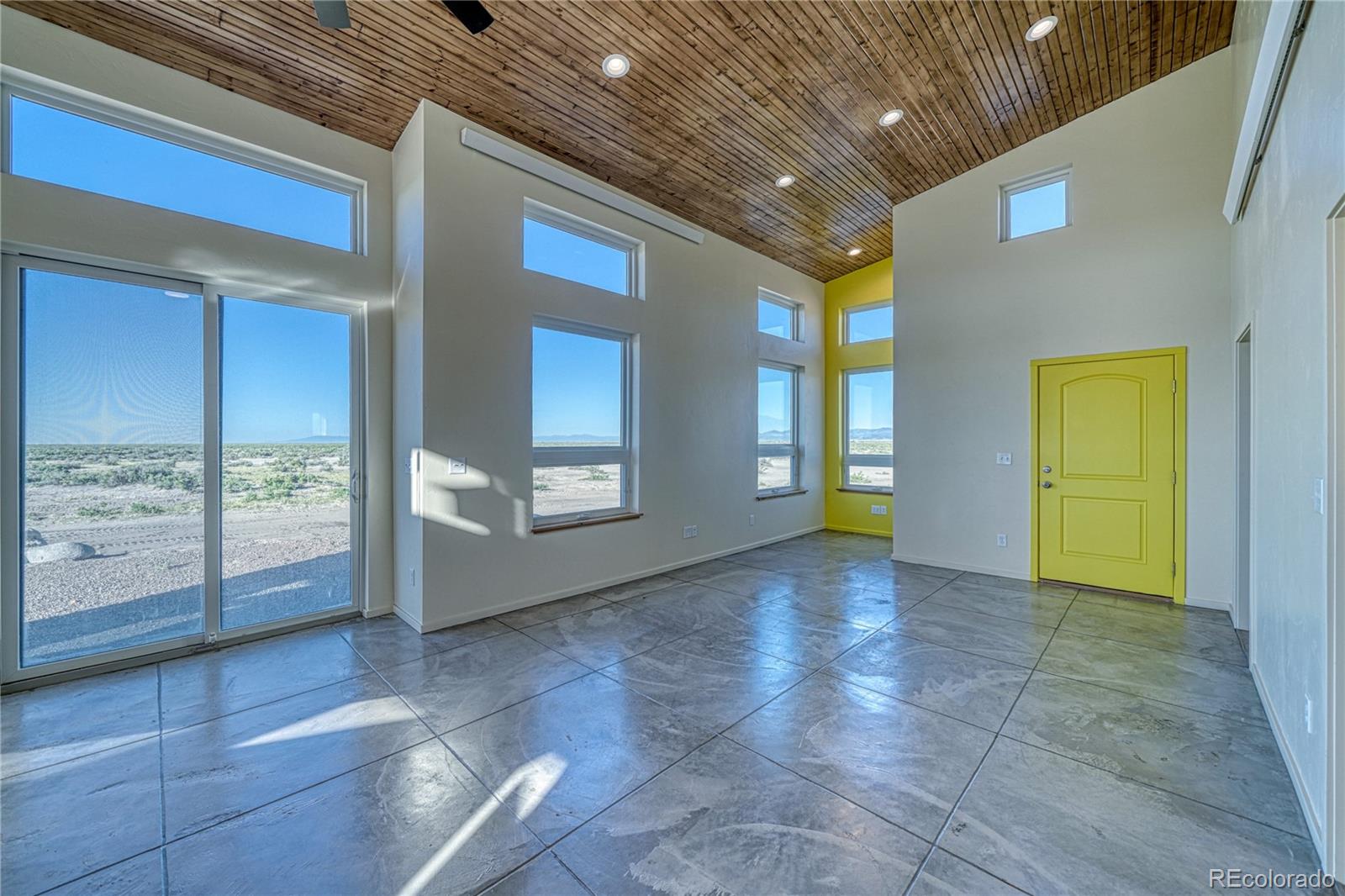 57884 Co Road Moffat, CO 81143 - Photo 17 of 40 a view of empty room with floor to ceiling window and outdoor view