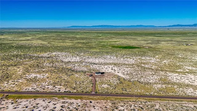 a view of beach and an ocean