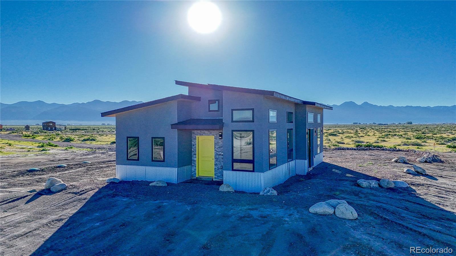 57884 Co Road Moffat, CO 81143 - Photo 40 of 40 a view of a house with a yard