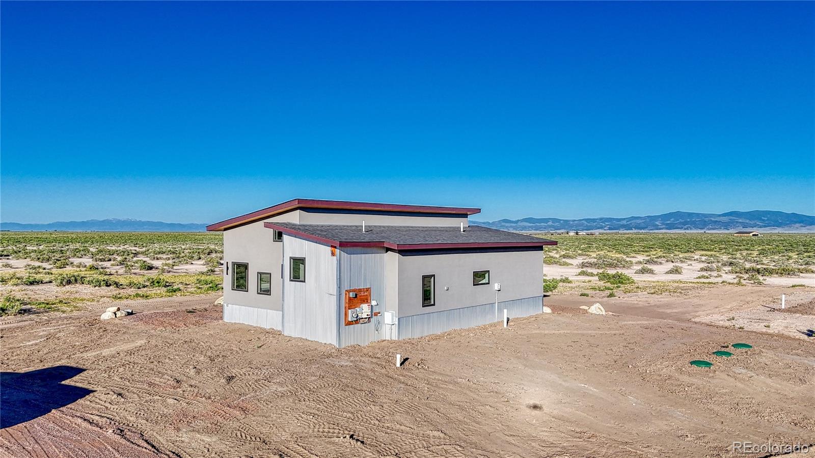 57884 Co Road Moffat, CO 81143 - Photo 6 of 40 a front view of a house with a yard