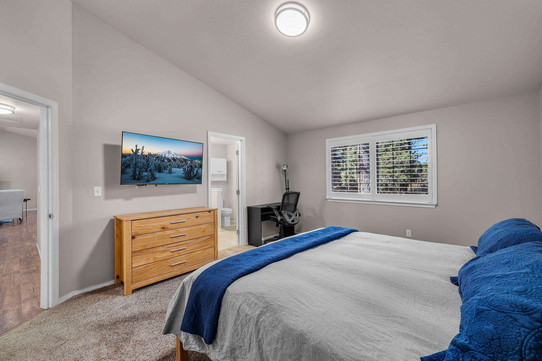 17064 Sacramento Road Bend, OR 97707 - Photo 17 of 50 a bedroom with a bed and a dresser