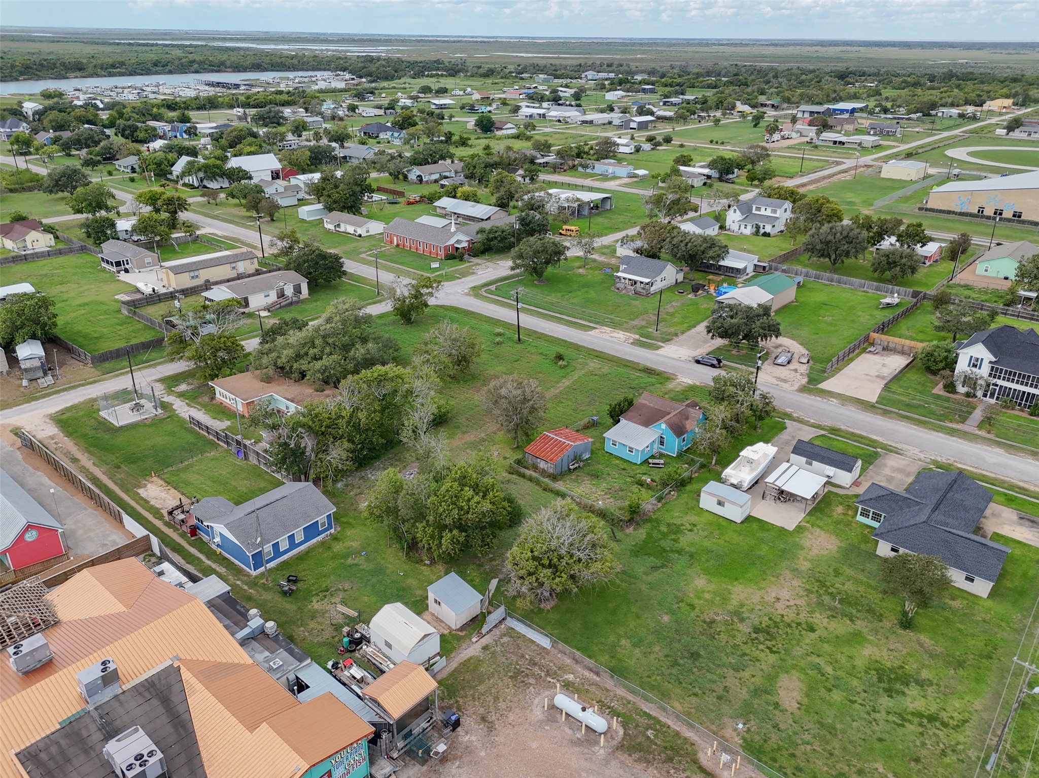 0 Lewis Street Matagorda, TX 77457 - Photo 4 of 9 an aerial view of residential houses with outdoor space