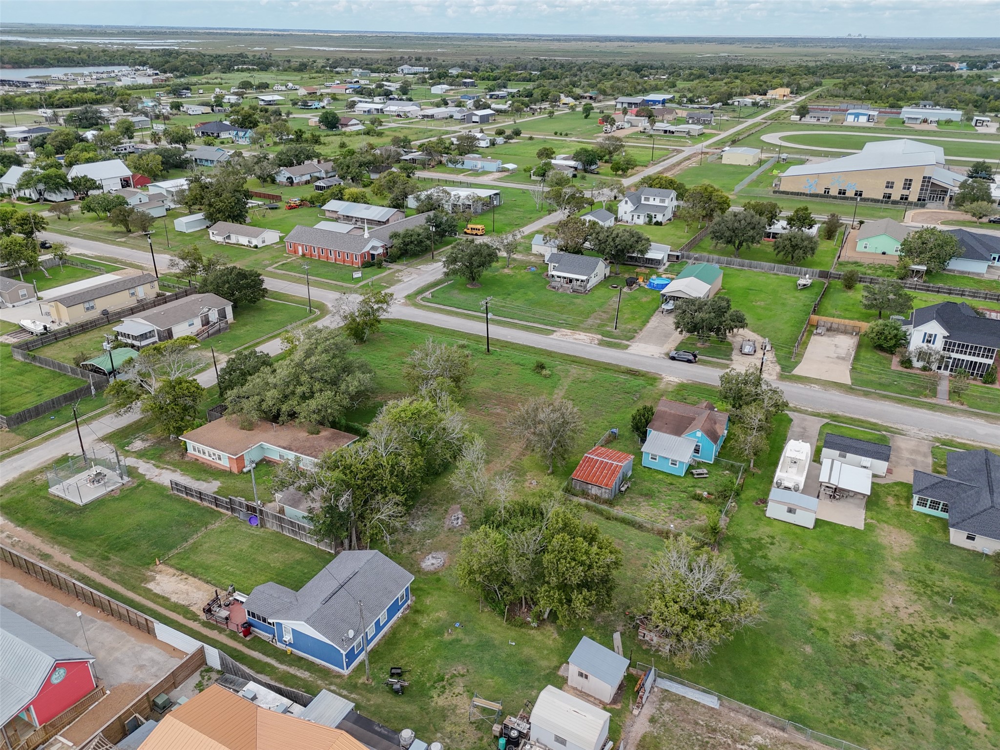 0 Lewis Street Matagorda, TX 77457 - Photo 5 of 9 an aerial view of residential houses with outdoor space and street view