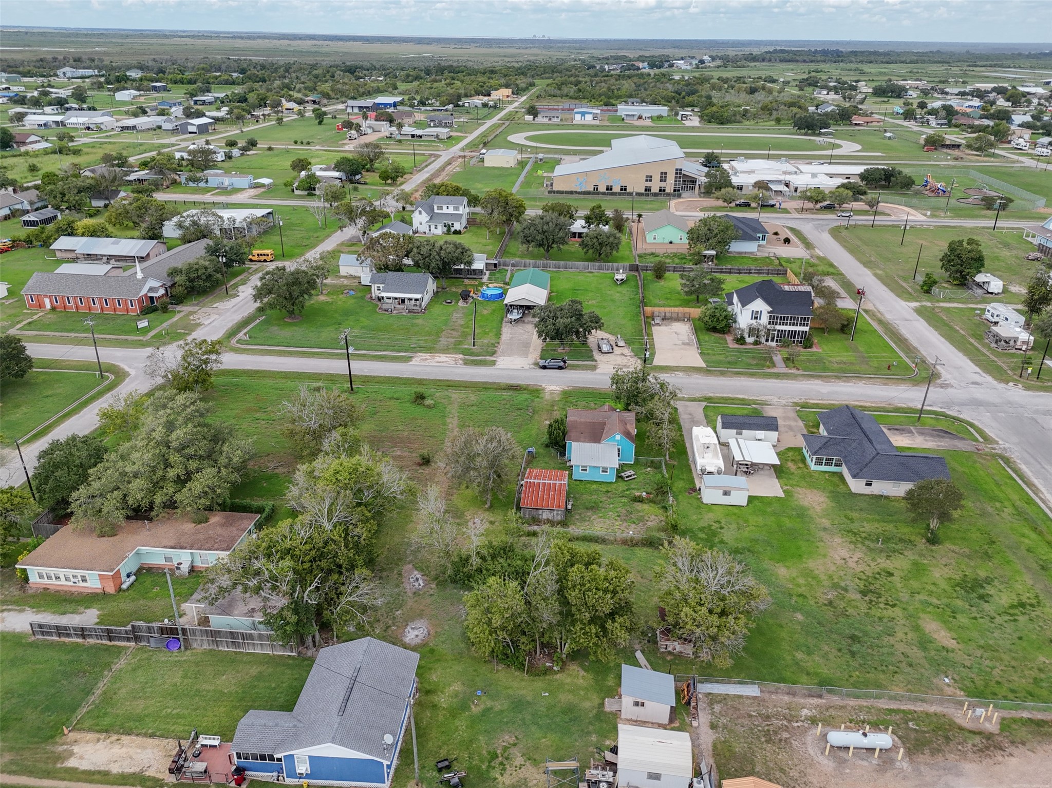 0 Lewis Street Matagorda, TX 77457 - Photo 6 of 9 an aerial view of residential houses with outdoor space and parking space