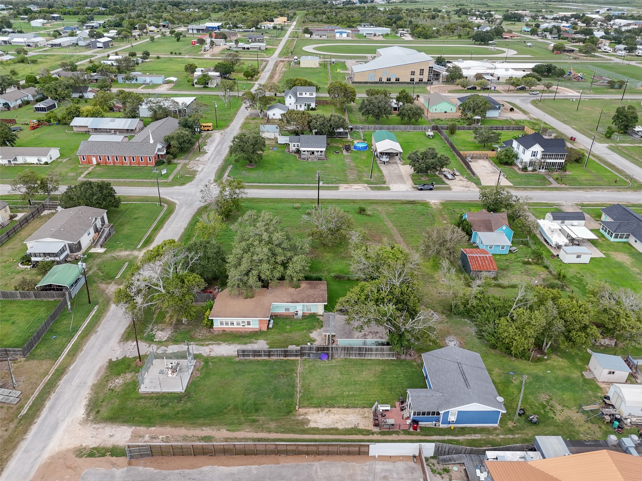 0 Lewis Street Matagorda, TX 77457 - Photo 7 of 9 an aerial view of residential houses with outdoor space and parking