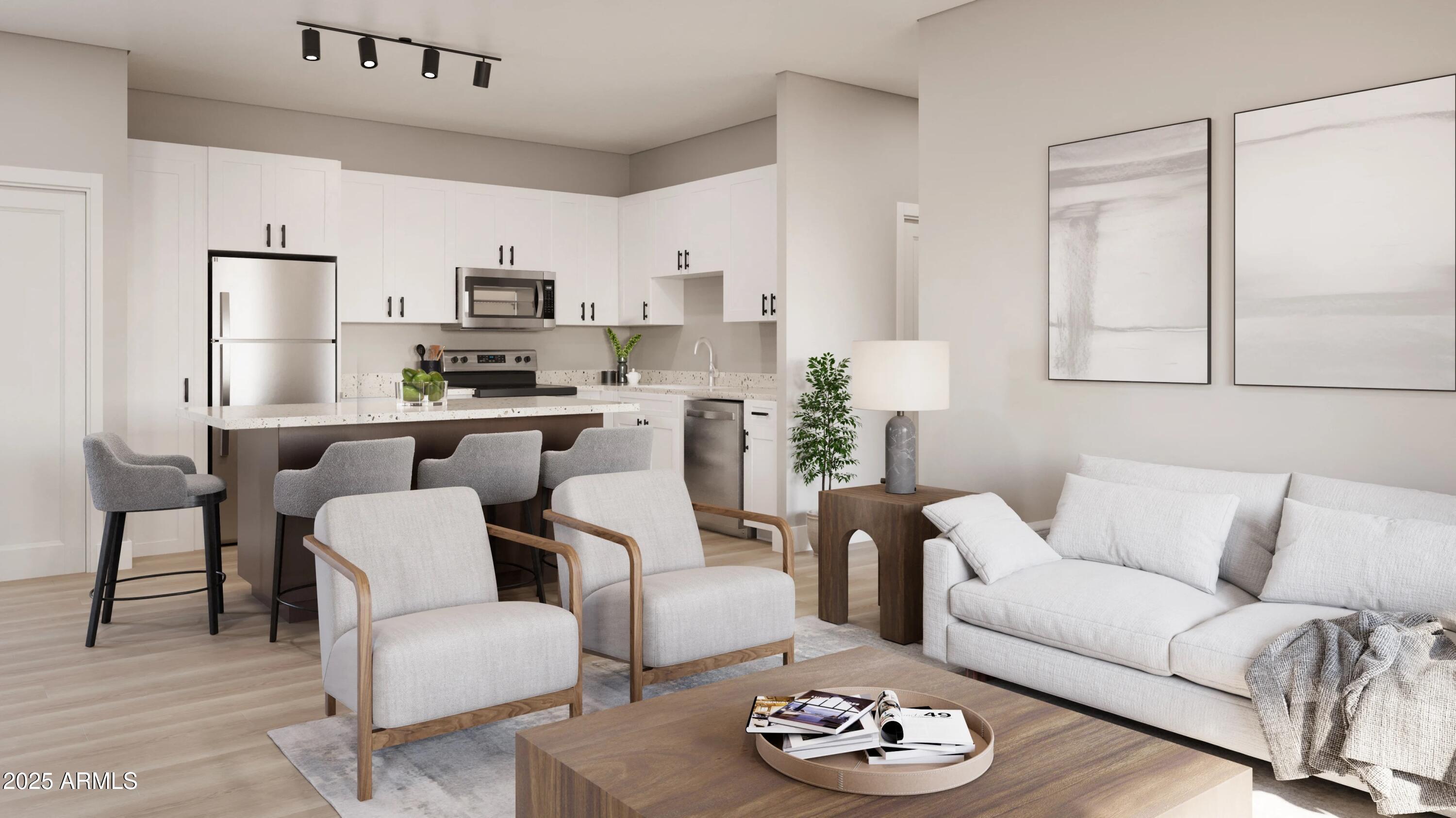 39696 West Lococo Street Maricopa, AZ 85138 - Photo 2 of 6 a living room with furniture kitchen and a table