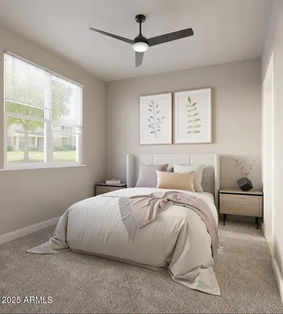 a spacious bedroom with a bed a couch and a window