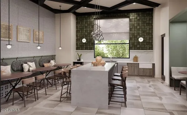 a view of a dining room with furniture and a window