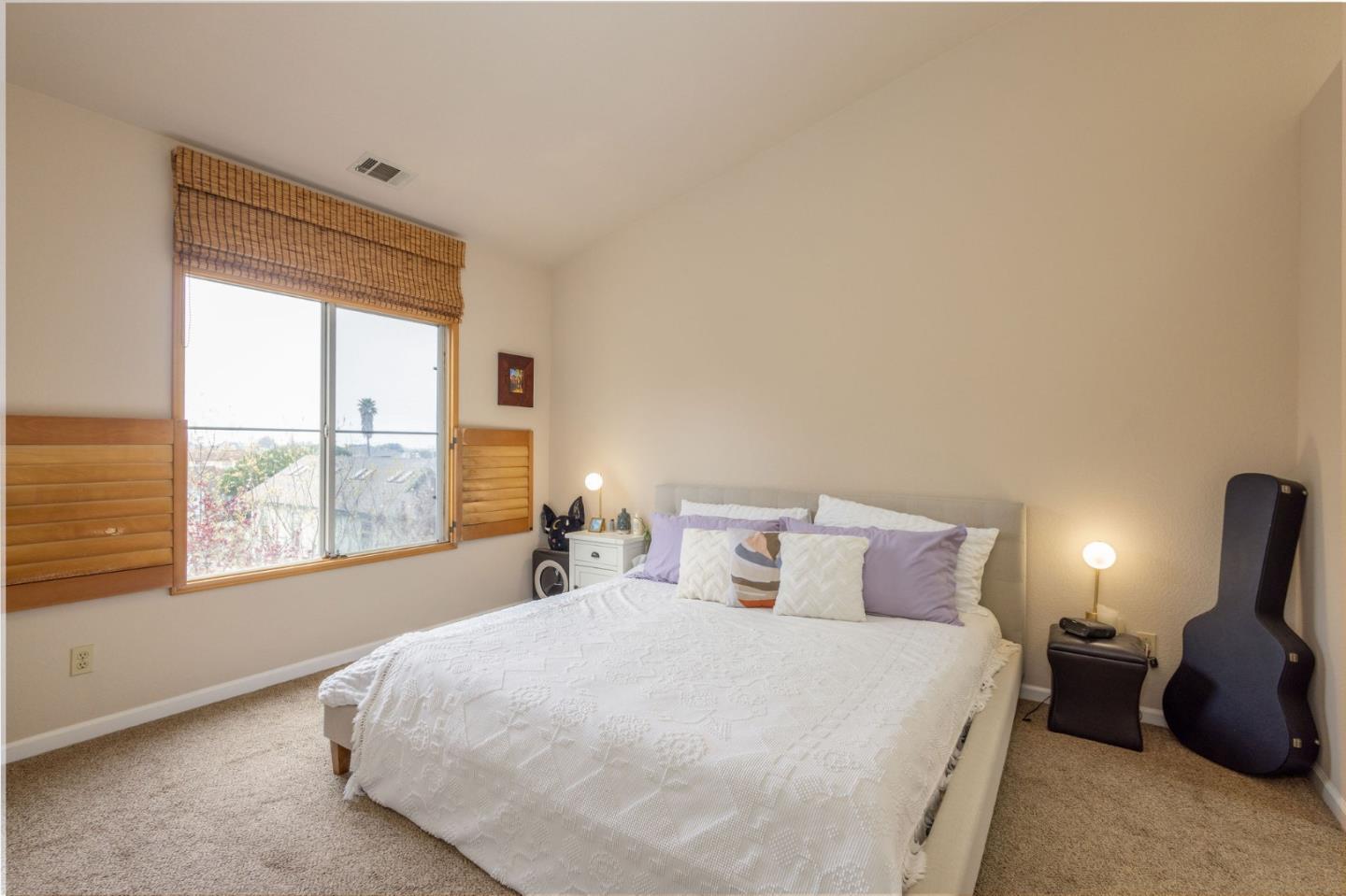 10 Patrick Way Half Moon Bay, CA 94019 - Photo 7 of 18 a bedroom with a bed and window