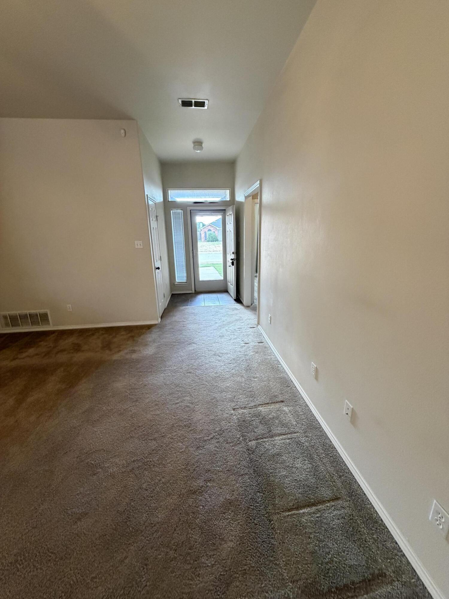 6544 84th Street Lubbock, TX 79424 - Photo 16 of 29 an empty room with windows