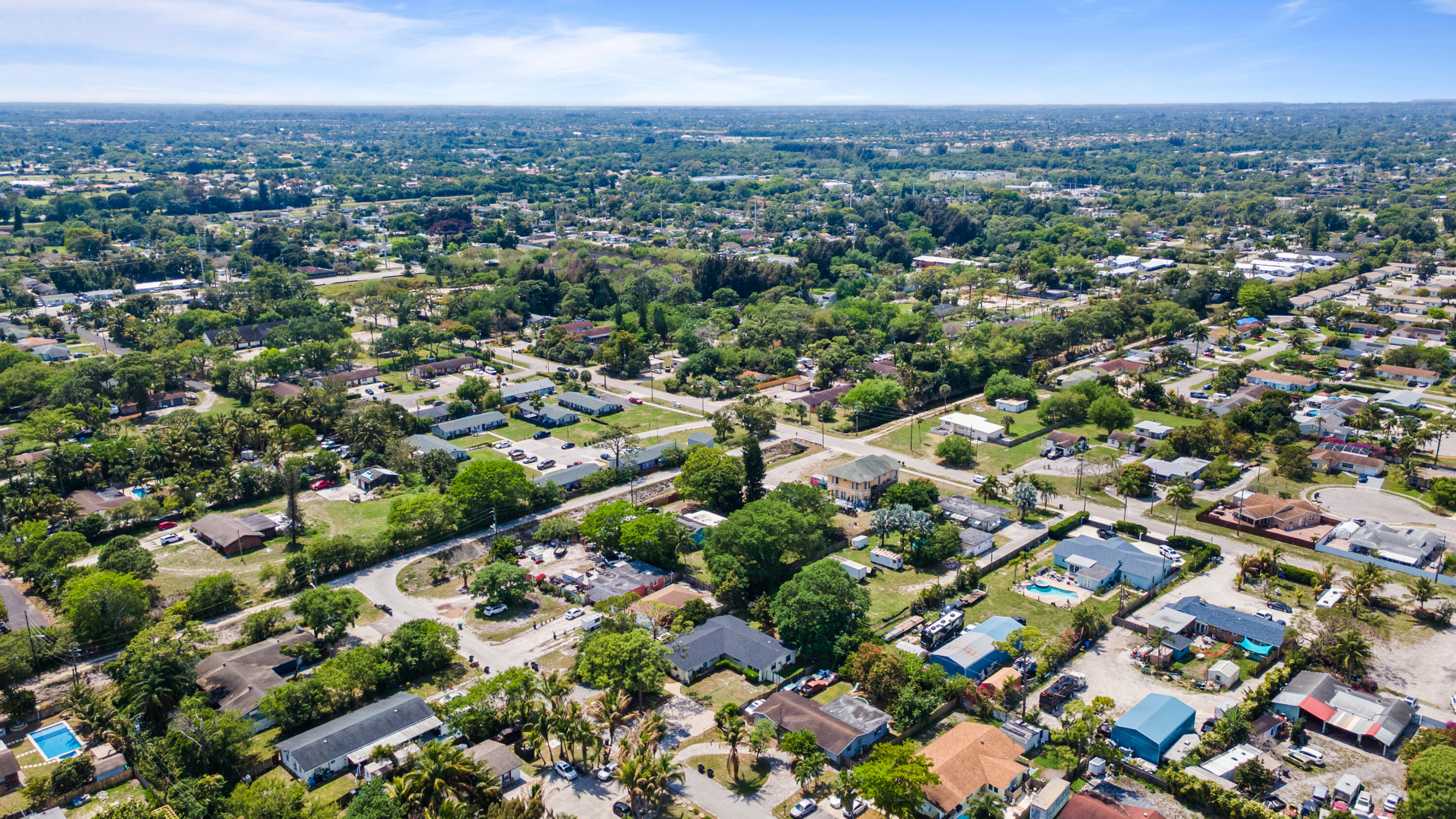 4453 Stevens Road Lake Worth Beach, FL 33461 - Photo 6 of 67 an aerial view of multiple house