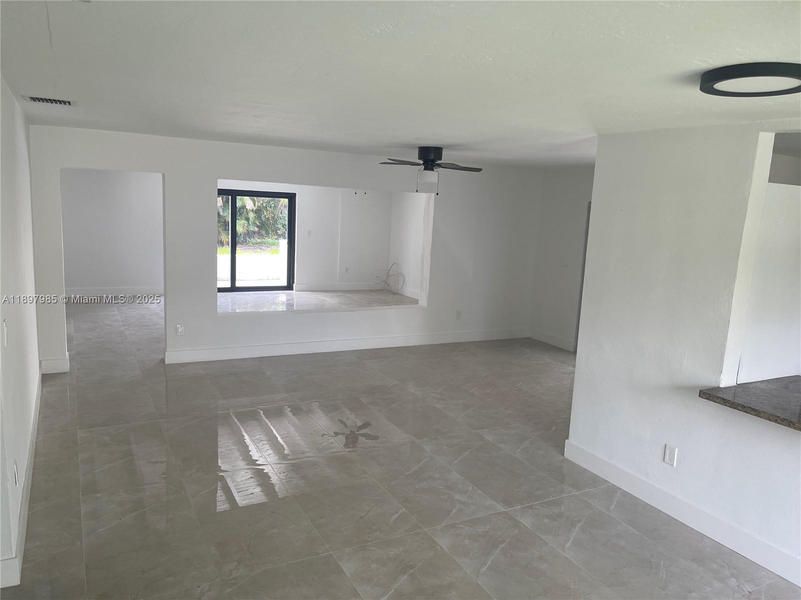 4310 Northwest 182nd Street Miami Gardens, FL 33055 - Photo 2 of 12 a view of empty room