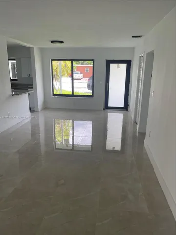 a view of a livingroom with a window