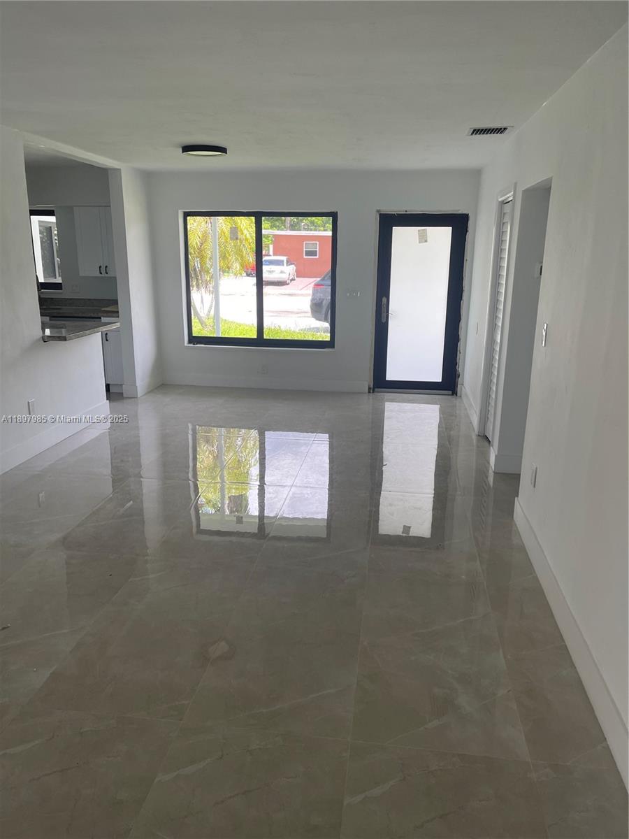 4310 Northwest 182nd Street Miami Gardens, FL 33055 - Photo 4 of 12 a view of a livingroom with a window