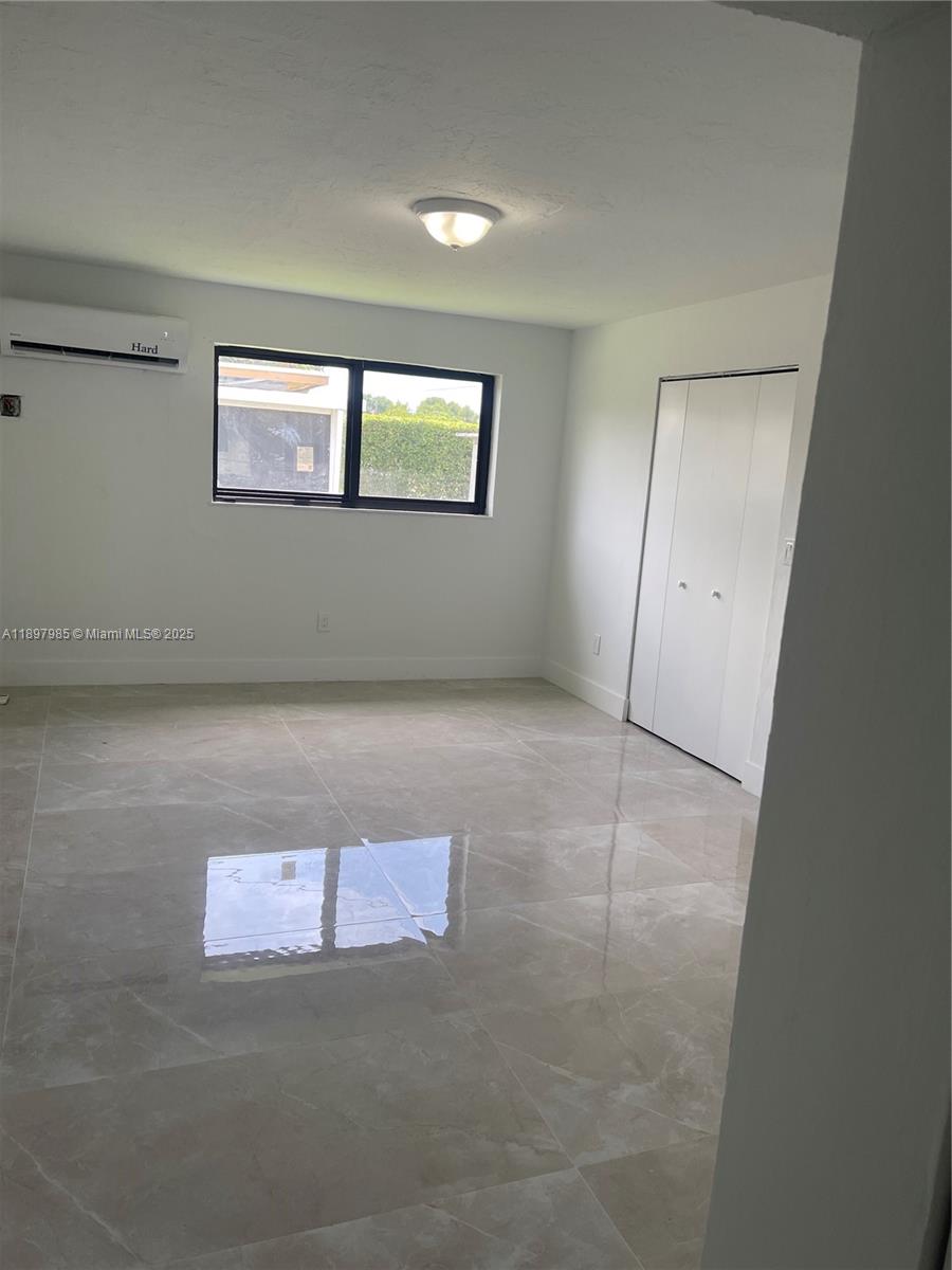 4310 Northwest 182nd Street Miami Gardens, FL 33055 - Photo 10 of 12 a view of an empty room