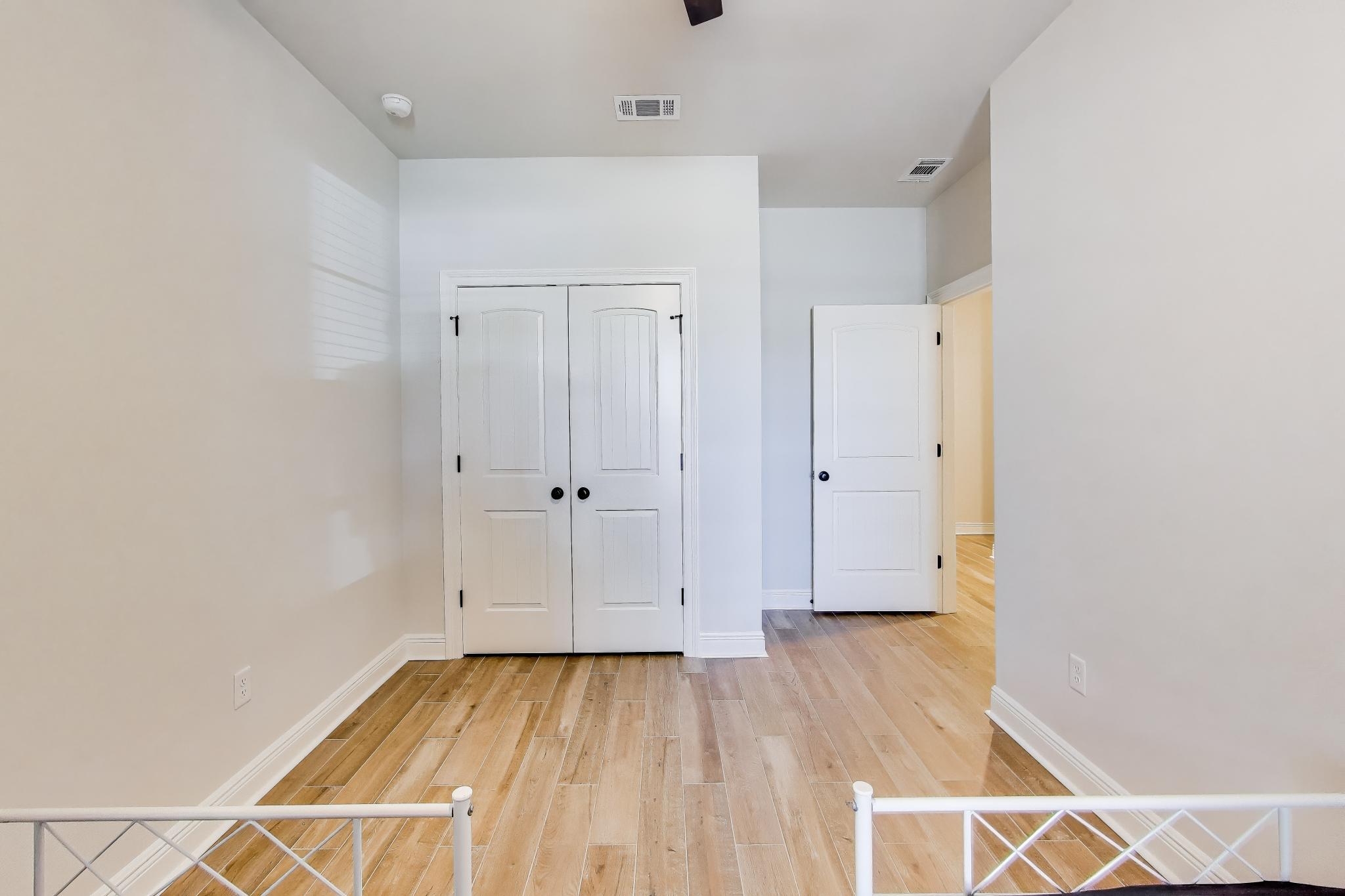 46 East Tweet Street Freeport, FL 32439 - Photo 27 of 59 a view of a room with wooden floor