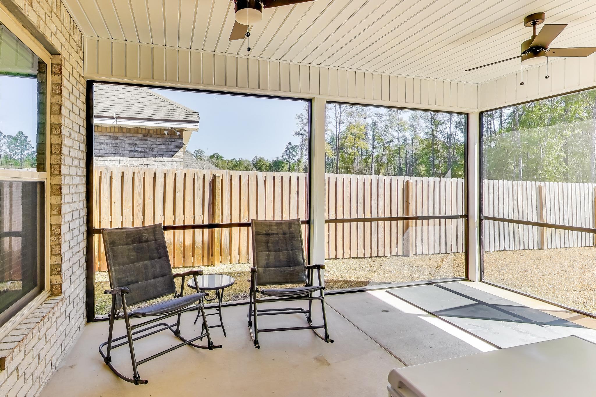 46 East Tweet Street Freeport, FL 32439 - Photo 35 of 59 a building outdoor space with patio furniture