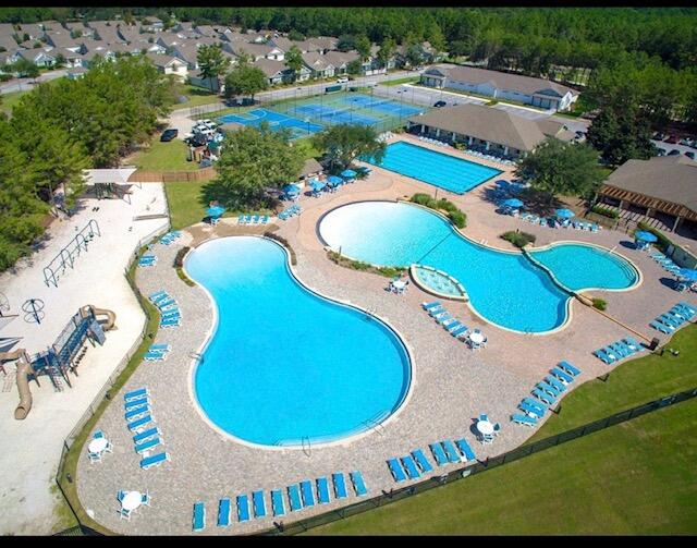 46 East Tweet Street Freeport, FL 32439 - Photo 47 of 59 an aerial view of a swimming pool patio and outdoor seating