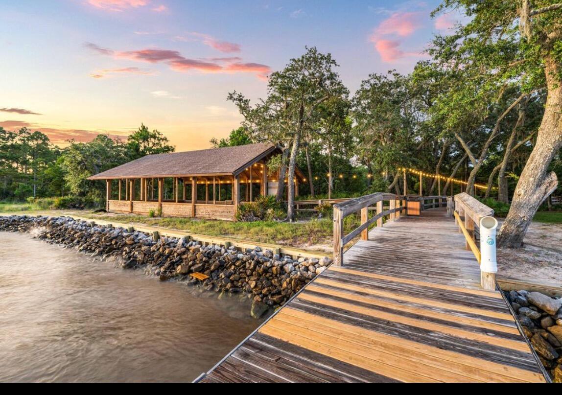 46 East Tweet Street Freeport, FL 32439 - Photo 57 of 59 a front view of a house with a yard