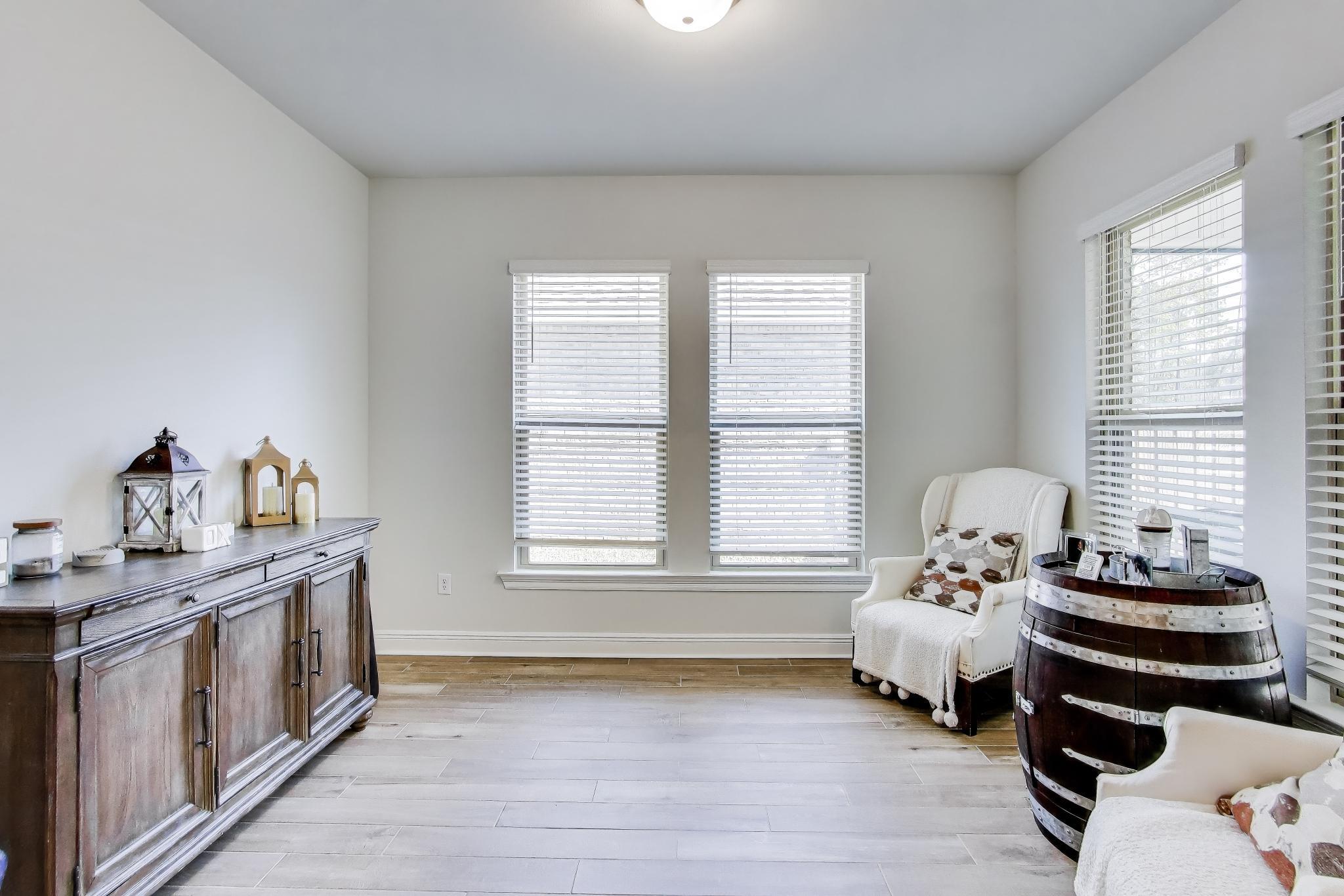 46 East Tweet Street Freeport, FL 32439 - Photo 9 of 59 a bedroom with furniture and a window