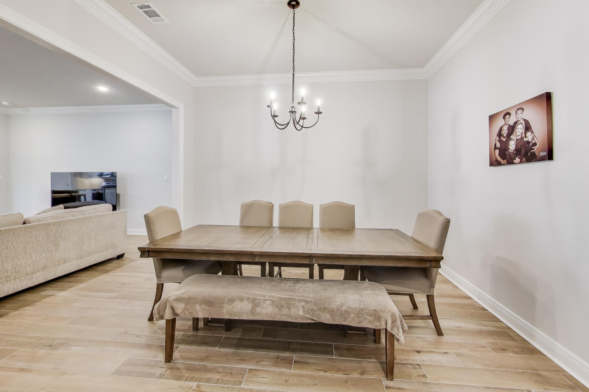 46 East Tweet Street Freeport, FL 32439 - Photo 10 of 59 a view of a dining room with furniture