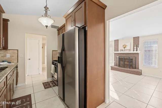 a view of a kitchen from the hallway
