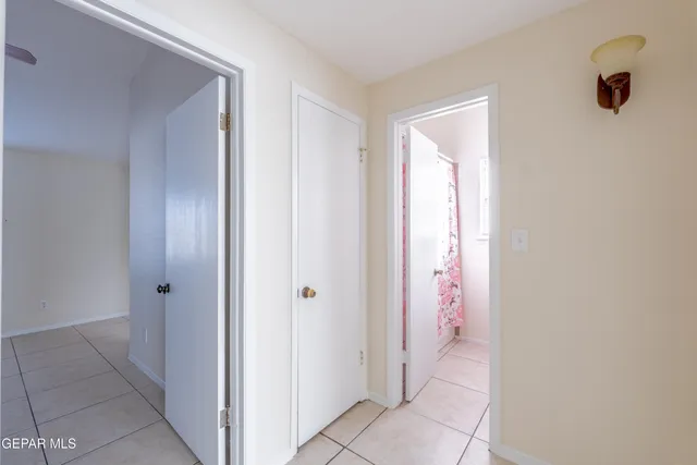 a view of a hallway with closet