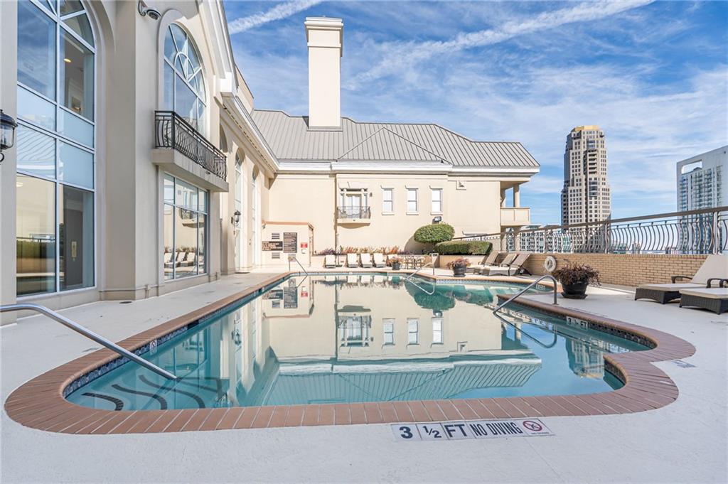 3334 Peachtree Road Northeast, Unit 312 Atlanta, GA 30326 - Photo 30 of 79 a view of a living room and window