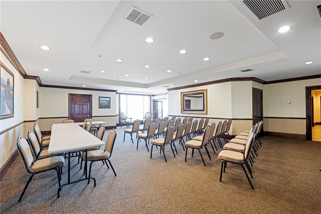 3334 Peachtree Road Northeast, Unit 312 Atlanta, GA 30326 - Photo 34 of 79 a dining room with furniture and a livingroom