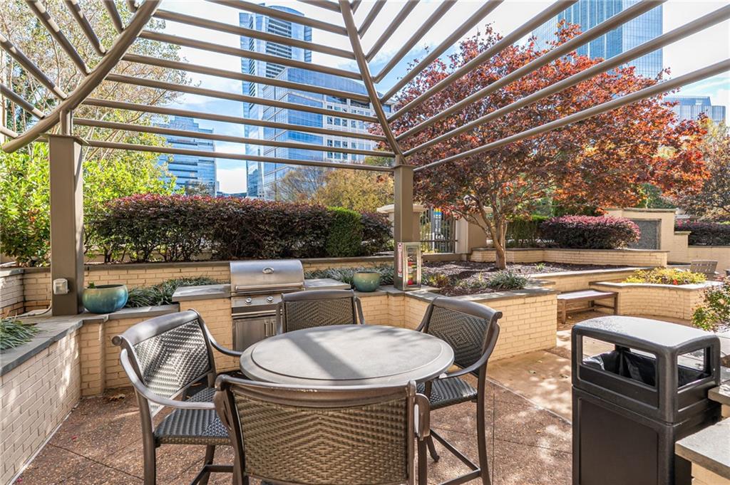 3334 Peachtree Road Northeast, Unit 312 Atlanta, GA 30326 - Photo 43 of 79 a outdoor space with lots of tables and chairs