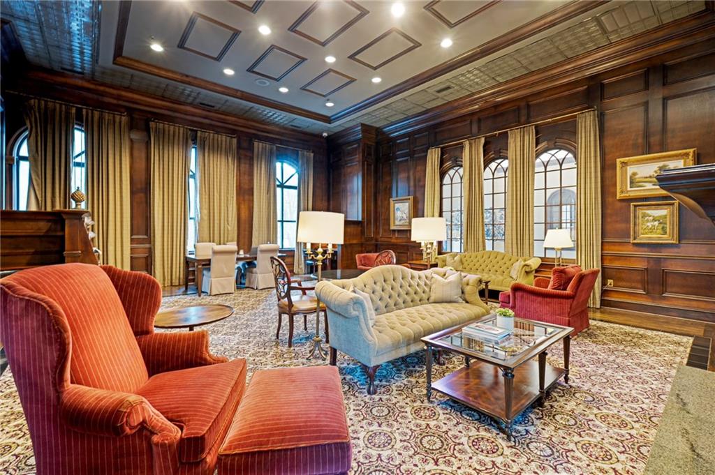 3334 Peachtree Road Northeast, Unit 312 Atlanta, GA 30326 - Photo 57 of 79 a living room with furniture and a large window