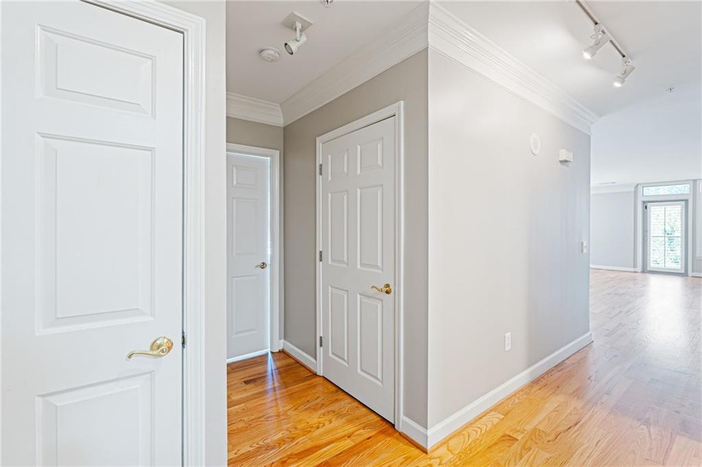 3334 Peachtree Road Northeast, Unit 312 Atlanta, GA 30326 - Photo 6 of 79 a view of a hallway with wooden floor
