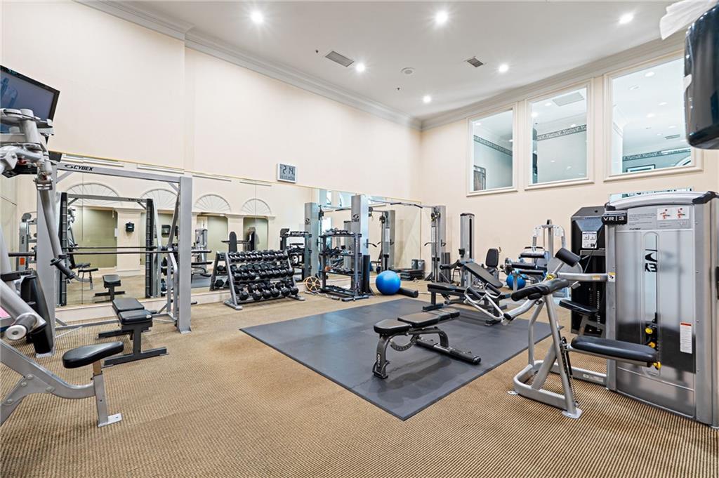 3334 Peachtree Road Northeast, Unit 312 Atlanta, GA 30326 - Photo 62 of 79 a living room with furniture gym equipment and a view of living room