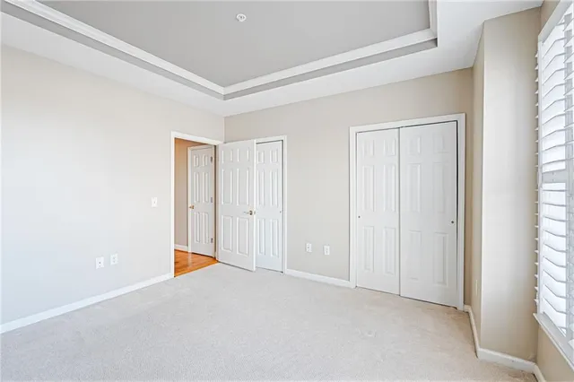 a kitchen with stainless steel appliances granite countertop a sink and a stove