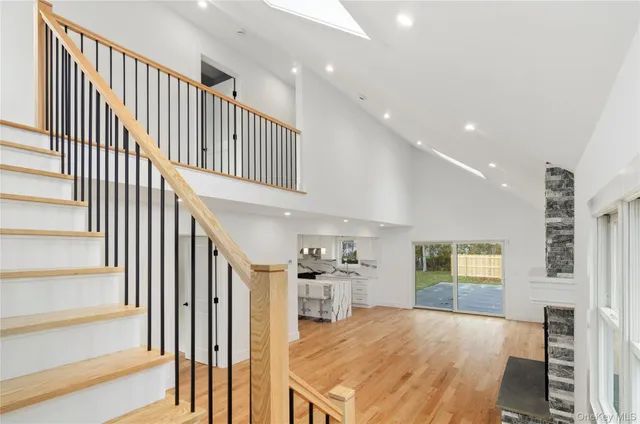 a bathroom with a sink toilet and mirror