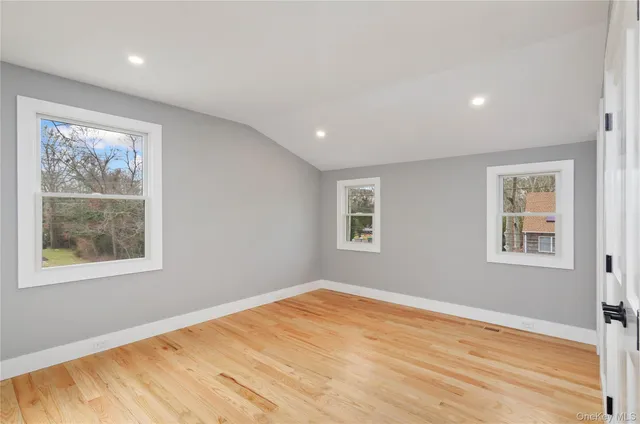 a view of living room with furniture and flat screen tv