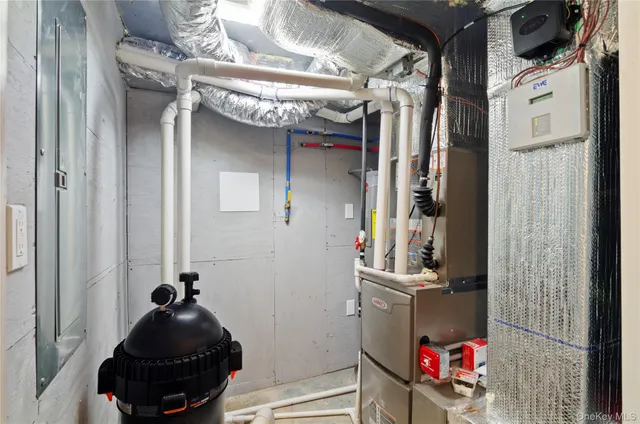 a view of a hallway with washer and dryer