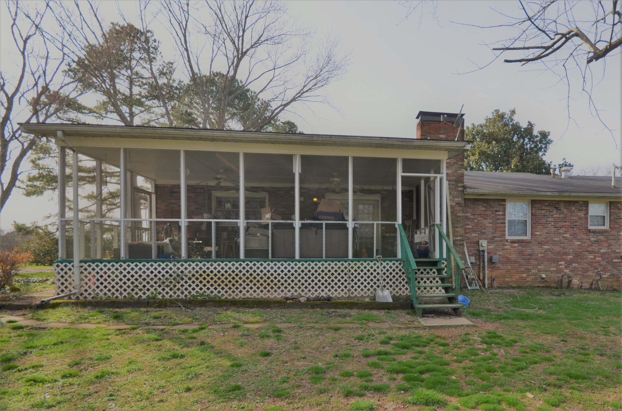 30 Remke Road Lawrenceburg, TN 38464 - Photo 11 of 49 a front view of a house with a garden